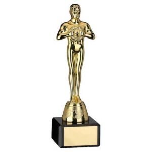 Gold Plastic Achievement Figure On Black Marble Trophy